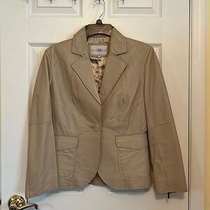 Nude leather jacket. Leather is soft like butter. 2 working pockets.